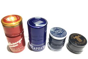 Aliuminio dangteliai už degtinės buteliuką